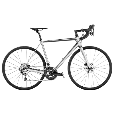Assortment of replacement bike parts including pedals, chains, and brake components