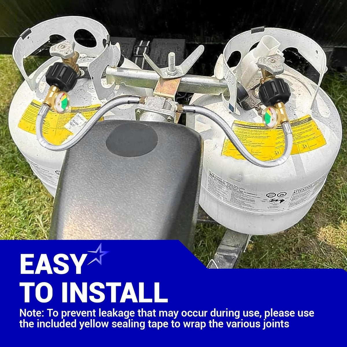 Two 15-inch stainless steel RV propane hoses with gauges installed on camper propane tanks connected to a regulator.