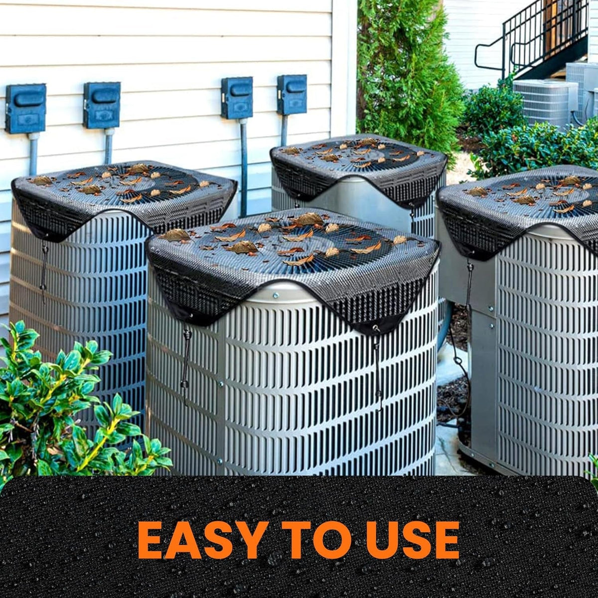 Black mesh 36x36 inch AC condenser covers installed on multiple outdoor central air conditioning units.