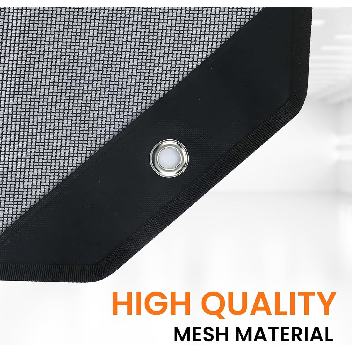 Close-up of 32-inch AC condenser mesh cover corner with reinforced black border and metal grommet.