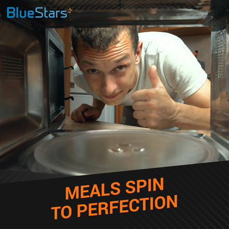 Man giving a thumbs up inside a microwave with a 12.75-inch glass turntable plate installed.