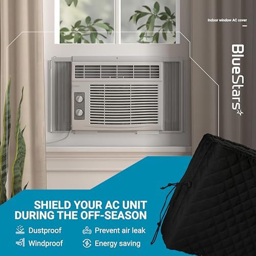 Black quilted indoor window air conditioner cover installed on a unit to prevent air leaks and save energy.