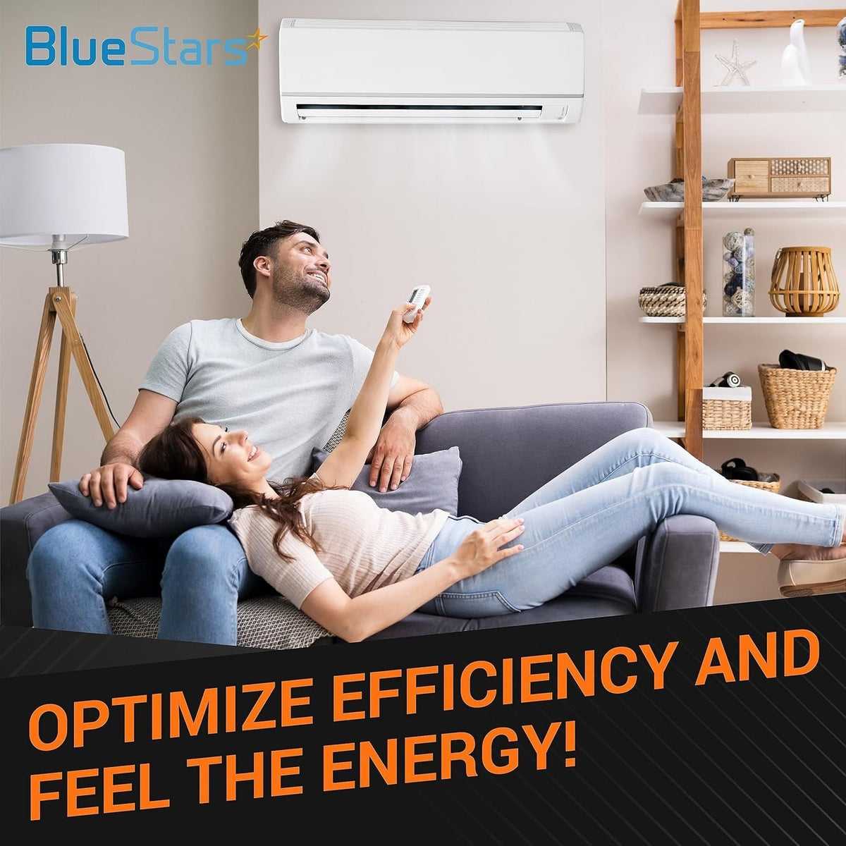 Couple relaxing on a sofa using a remote control to operate a wall-mounted Blue Star air conditioner.