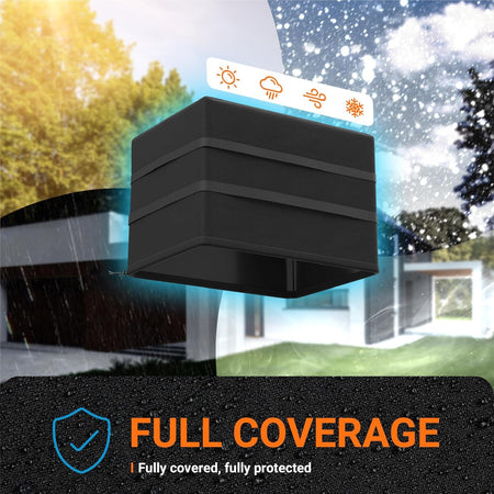 Heavy-duty black window air conditioner cover providing all-weather protection against sun, rain, and snow.