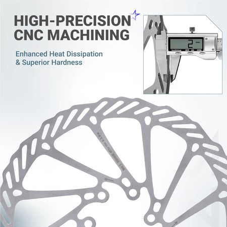 Close-up of 180mm stainless steel bike disc brake rotor showing 2mm thickness measurement with digital caliper.