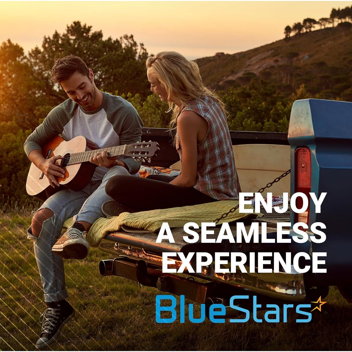 Couple sitting on a Toyota truck tailgate playing guitar, promotional image for BlueStars replacement parts.