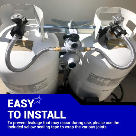 Two stainless braided RV propane pigtail hoses connected to propane tanks and a two-stage regulator.