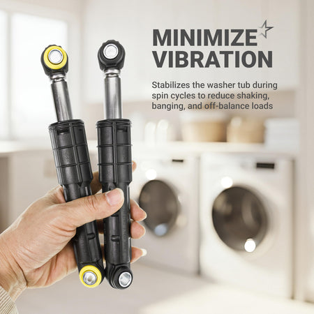 Hand holding two Samsung washing machine shock absorbers to minimize vibration and stabilize the tub.