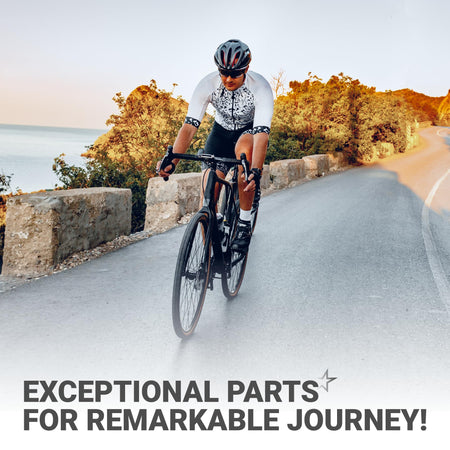 Cyclist riding a road bike on a coastal path, representing the performance of compatible Shimano SPD bike cleats.