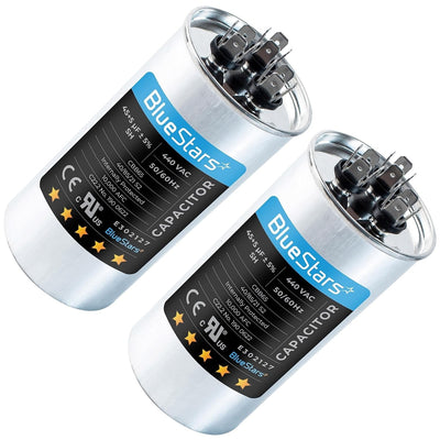 Two BlueStars 45+5 uF 370/440 VAC round dual run capacitors for AC motor and condenser fan applications.