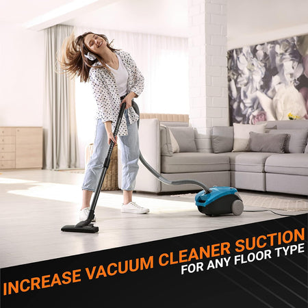 Woman using a vacuum cleaner in a living room to demonstrate improved suction power for floor cleaning.