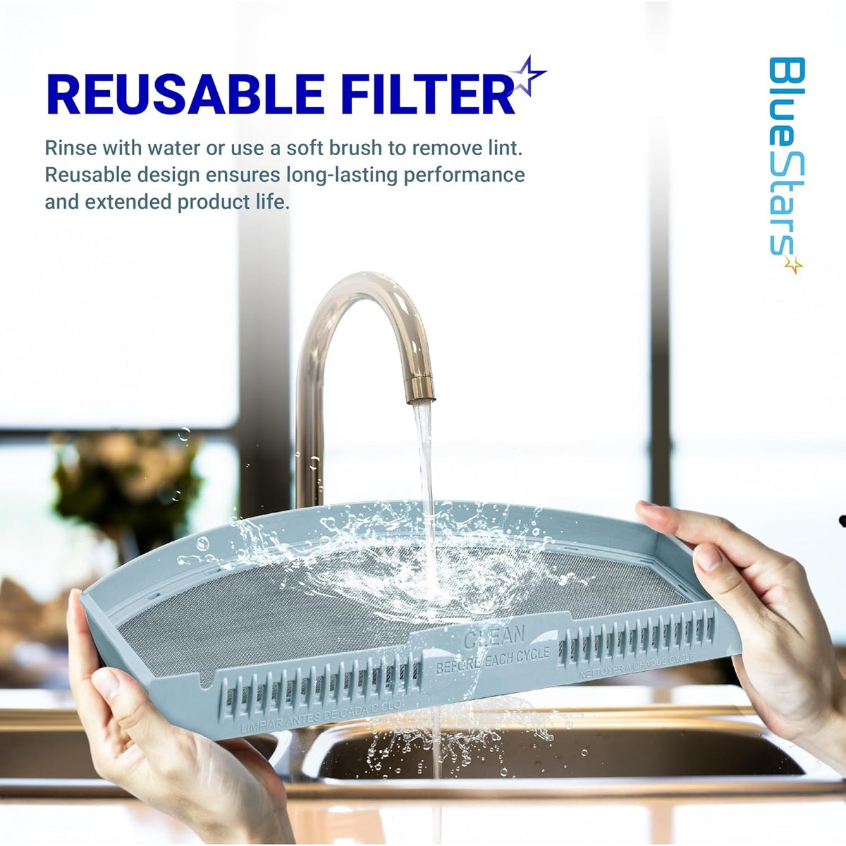 Hands rinsing a WE03X23881 dryer lint filter under a kitchen faucet to demonstrate its reusable design.